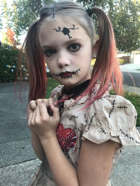 Step-by-Step Instructions for Creating a Voodoo Doll Look with a Face Paint Kit